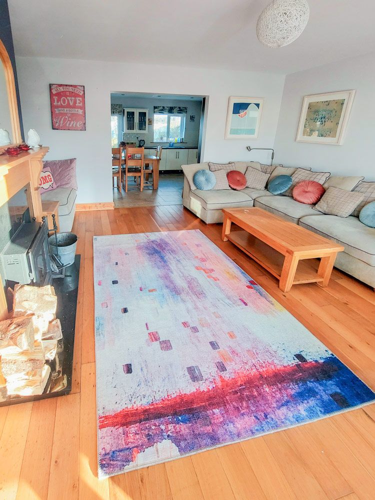 Living area leading to kitchen/dining